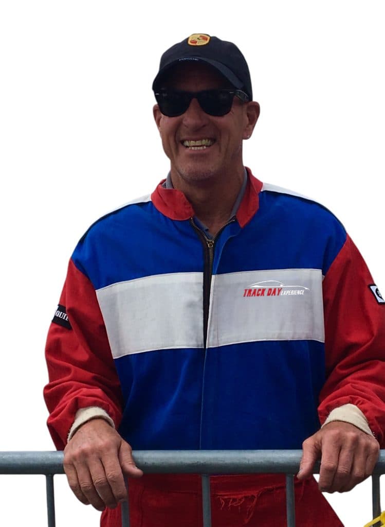 Marcus Cole in his driving suit in the paddock